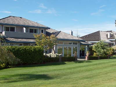 Terry & Jenny's home as seen from the golf course side