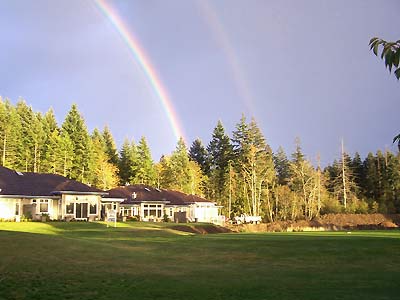 Rainbow over a neighbour's house