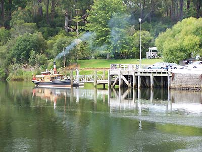 Steamboat pulling away from the dock at the Old Stone Store