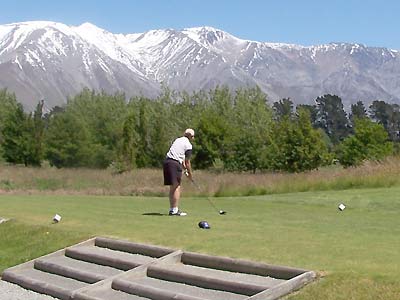 John teeing off