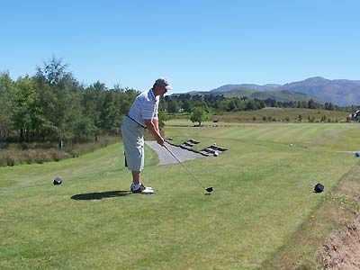 Ray teeing off