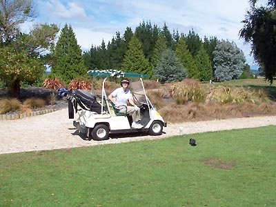 Sharon sitting on the sole GreenAcres power cart