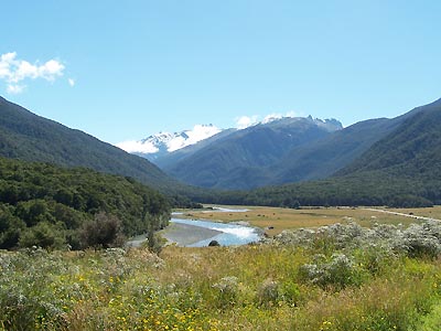 River, valley and snow-capped peak seen from the Hasst Pass