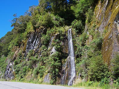 Natural waterfall along the Pass