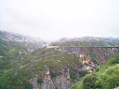 Approaching an unused railroad bridge