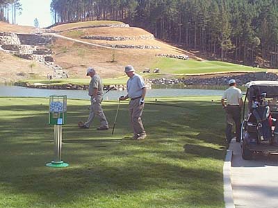 Gumball machine for balls on the 11th tee